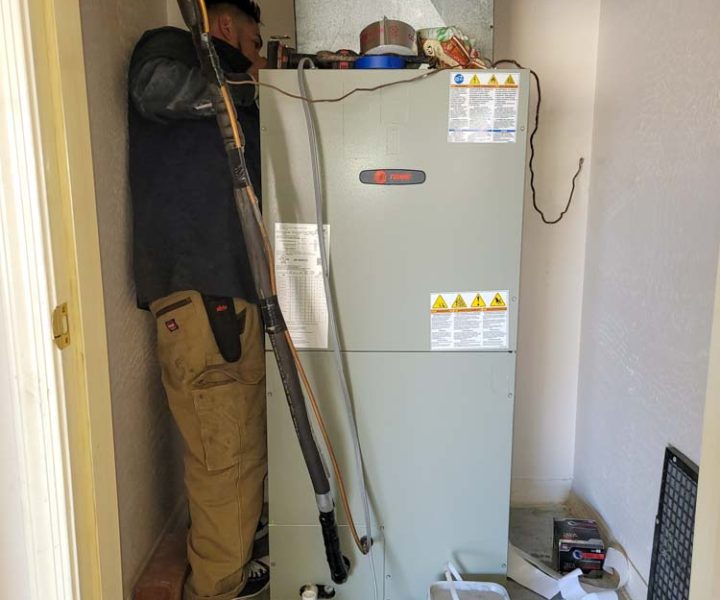 An HVAC technician does a thorough inspection and repair
